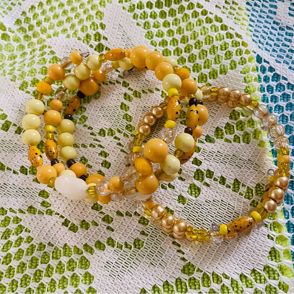 2pcs Yellow and Gold Beaded Bracelets